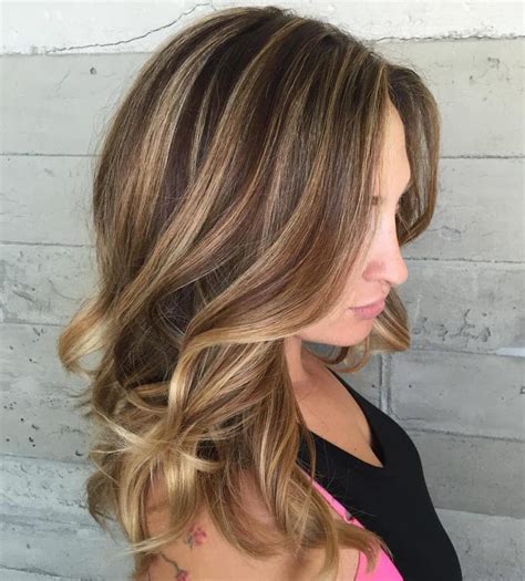 Brunette hair with lowlights - 8. Curly Pixie with Blonde Highlights. Combine stunning hues of brown with blonde highlights to craft an unparalleled dimension in your curly pixie cut. Dimensional …